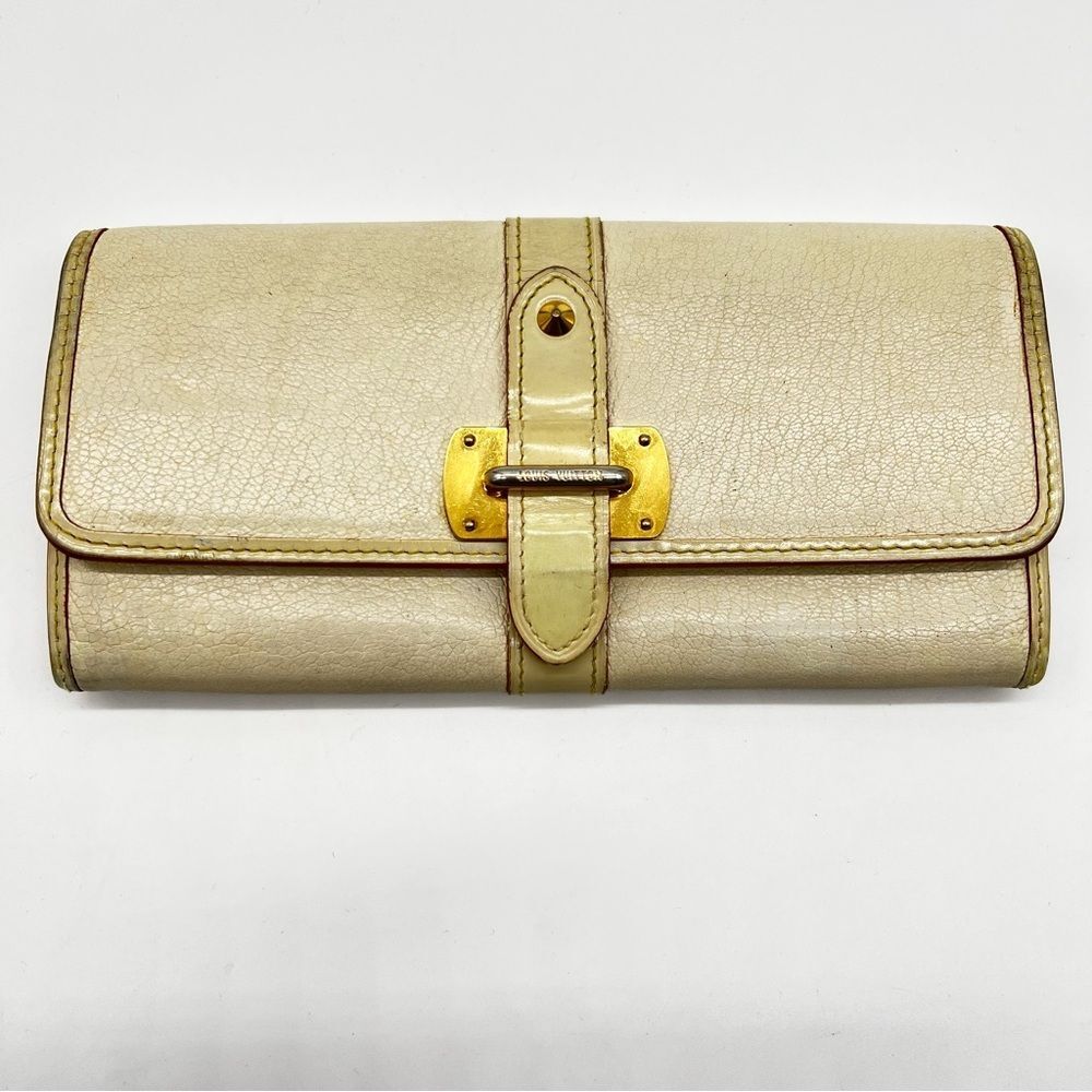 Louis Vuitton Cream Leather w/Gold Metal Red Trim/Yellow Stitching Suhali Wallet